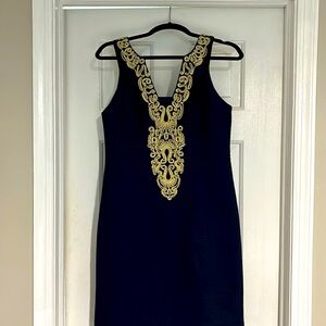 Navy blue Lilly with gold trim.